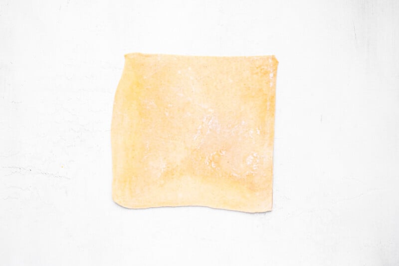 pie dough rolled out into a rectangle.