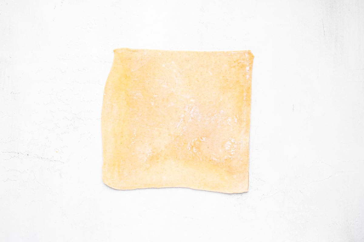 pie dough rolled out into a rectangle.