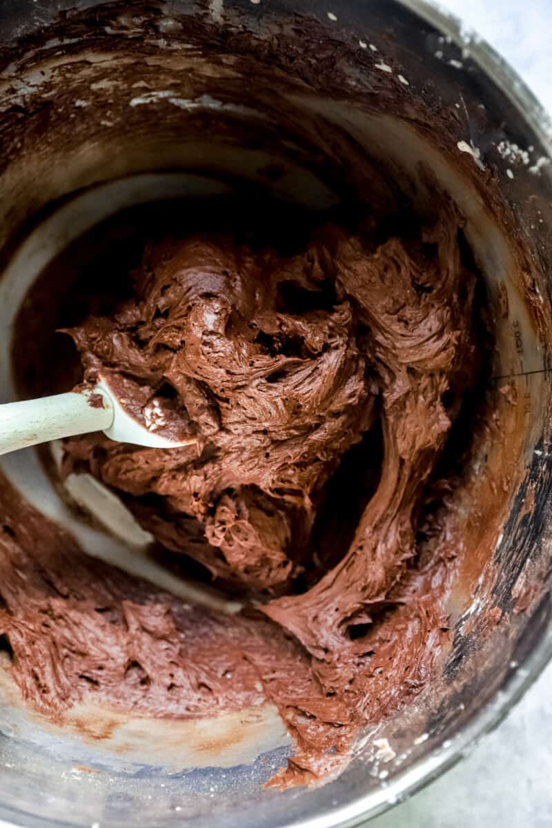 chocolate frosting in a mixing bowl