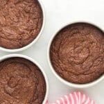 baked brownie cake layers in 8-inch round cake pans.