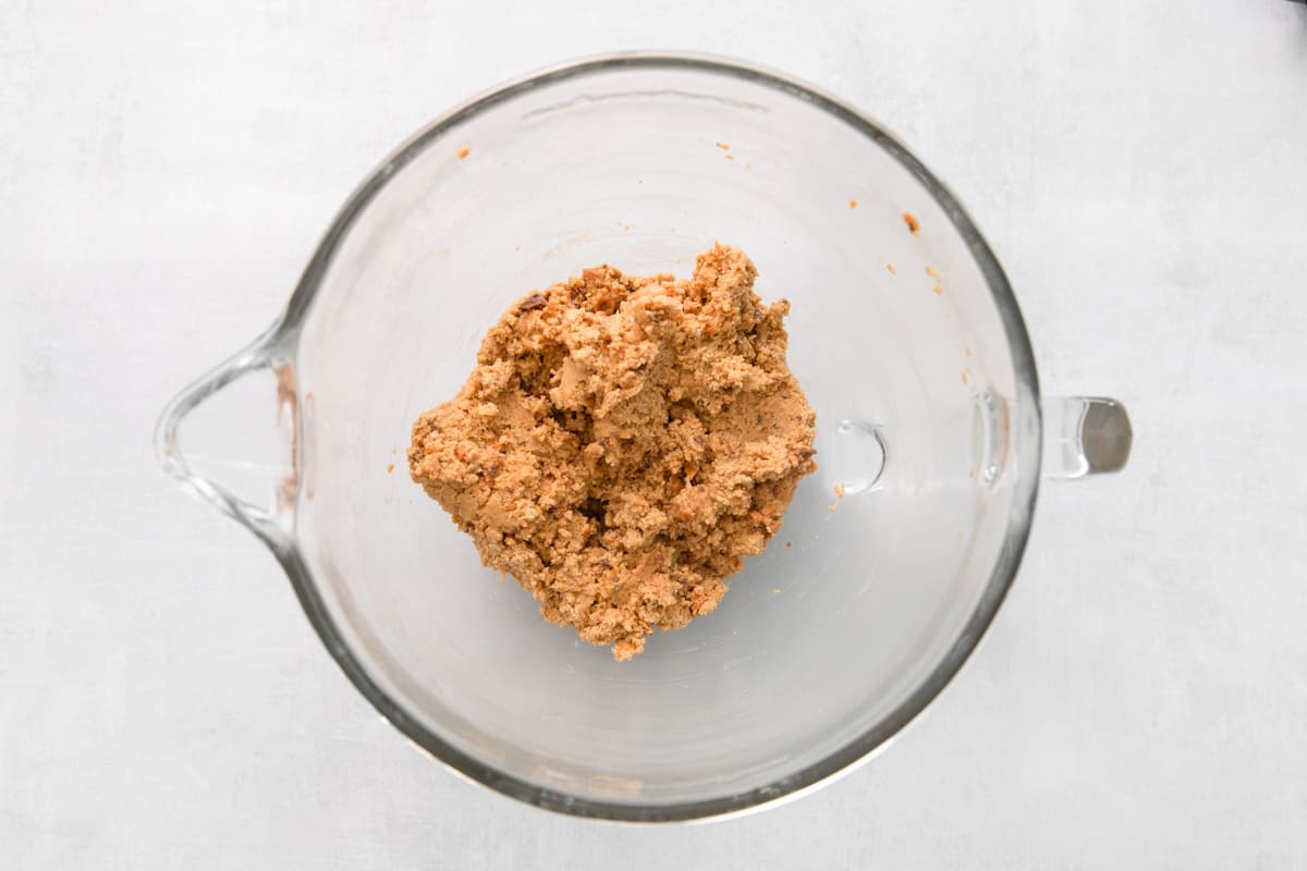 butterfinger ball dough in a glass mixing bowl.