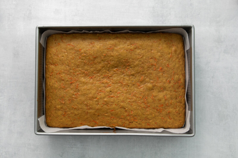 baked carrot cake in a 9x13 cake pan.