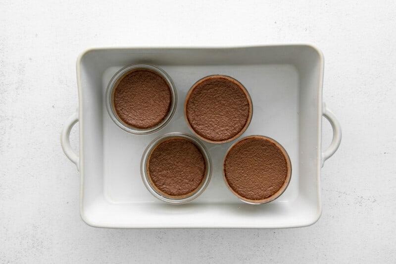 chocolate pots de creme set in a baking pan
