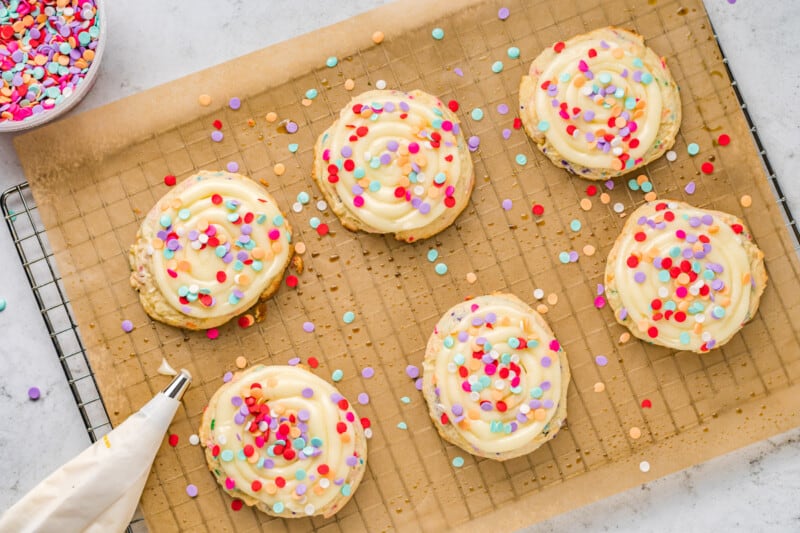 decorated confetti cake mix cookies on a cooling rack