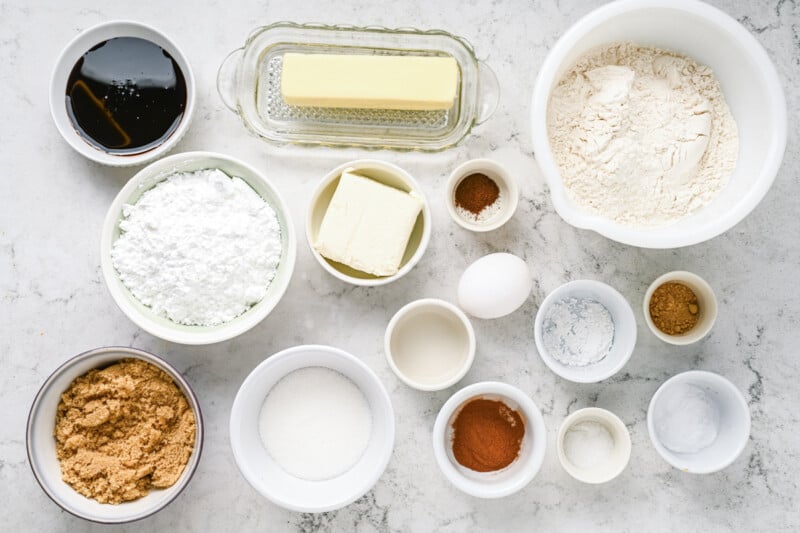 overhead view of ingredients for frosted gingerbread cookies.