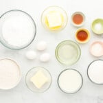 overhead view of ingredients for letter to santa cake in glass bowls.