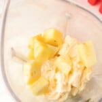 pineapples and ice cream in a blender