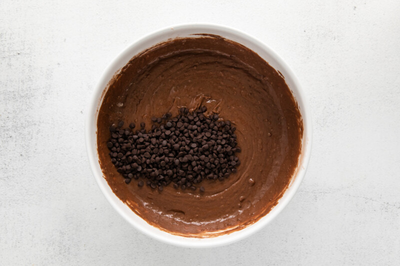 mixing chocolate chips into batter