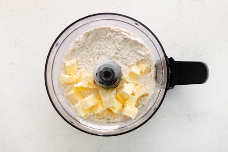cubes of butter and dry ingredients in a food processor