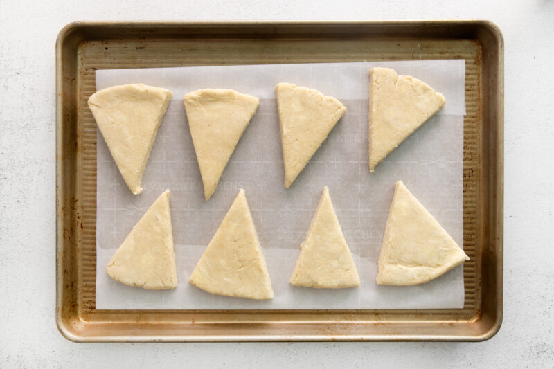 scone dough lined up on a tray, before baking