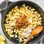 combining apple pie filling ingredients in a pot