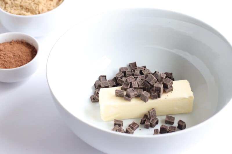 stick of butter and cubes of chocolate in a bowl