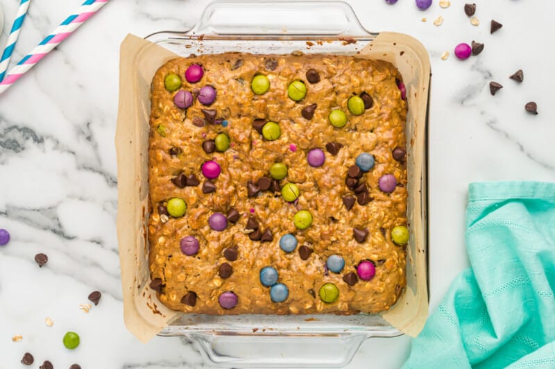 monster cookie bars baked in a square pan