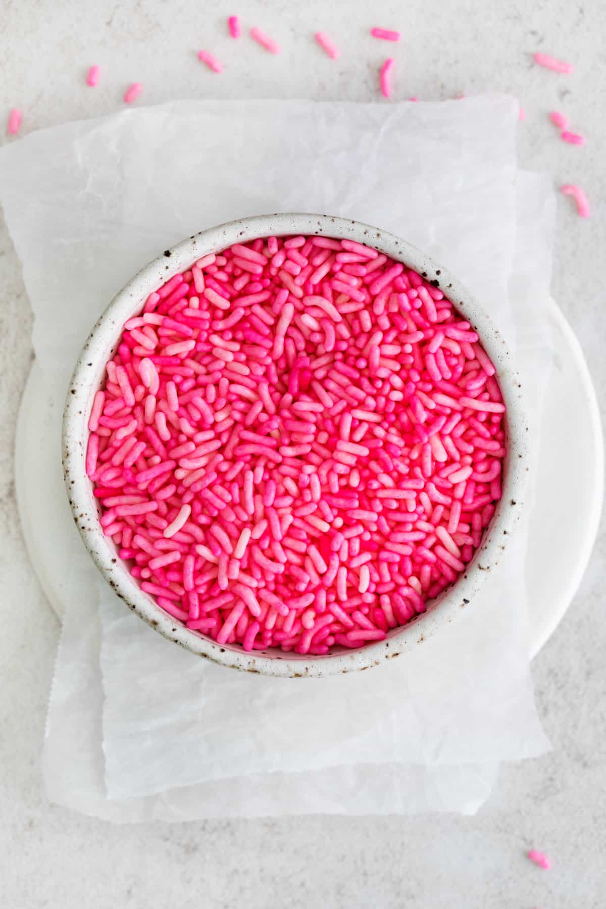 a bowl of homemade dyed sprinkles