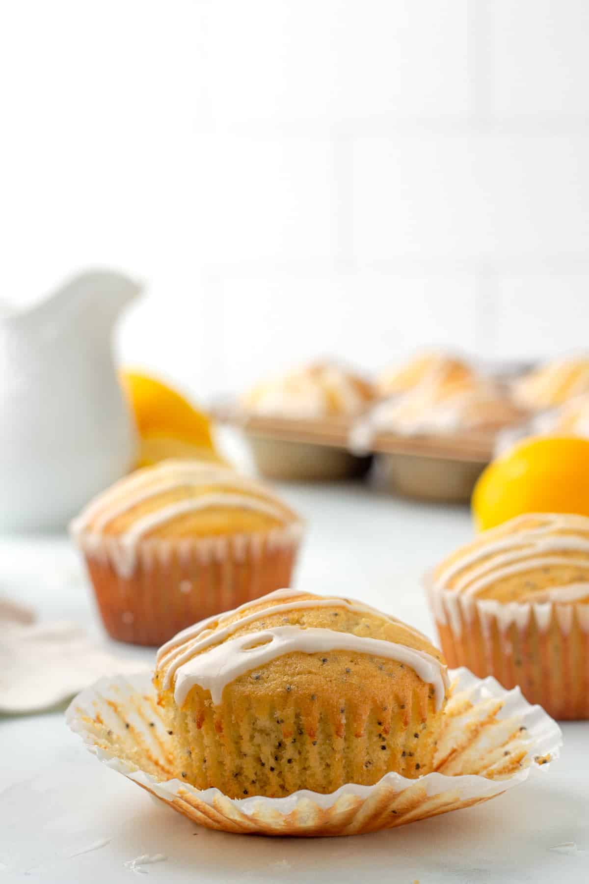 lemon poppy seed muffins arranged on a countertop