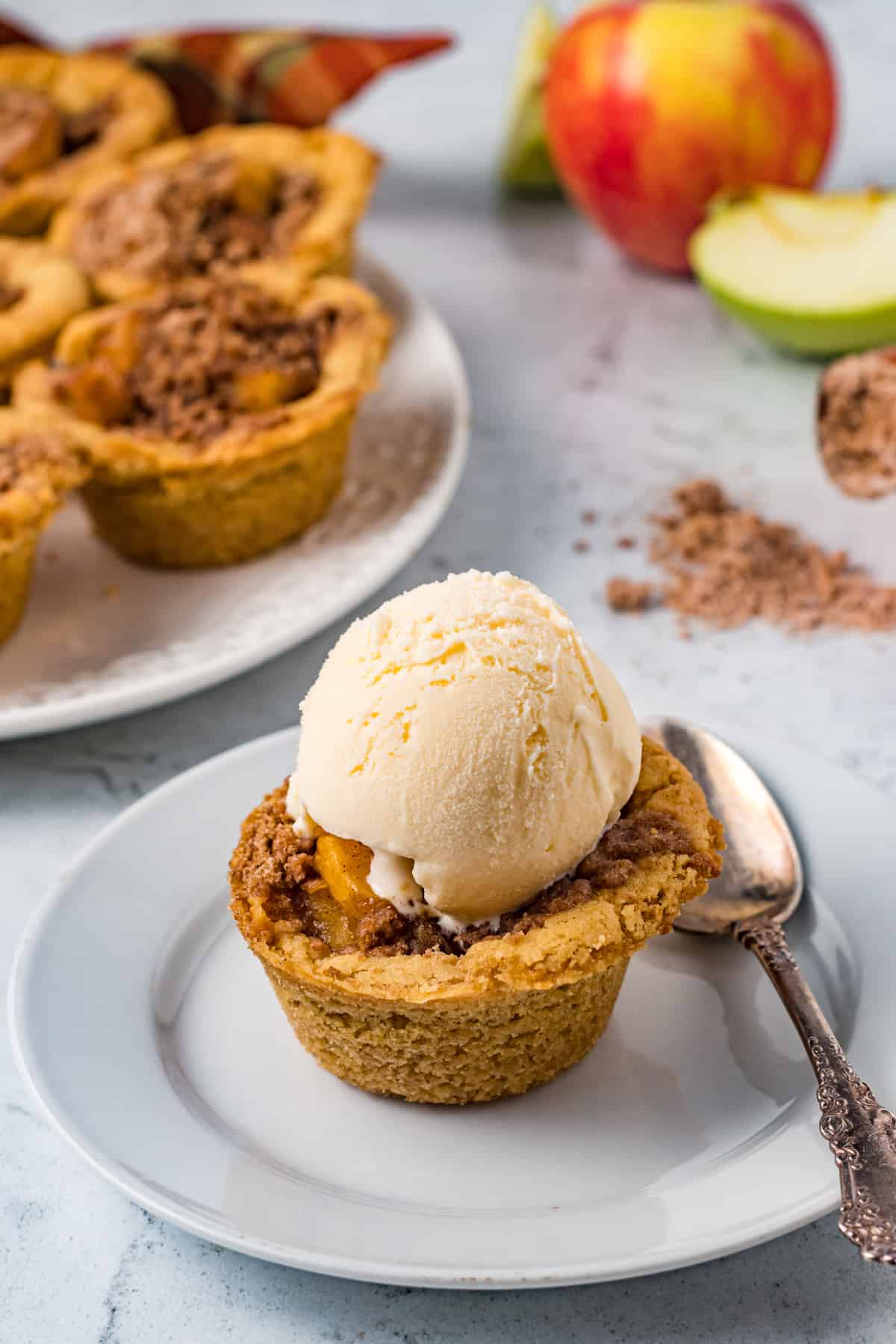 mini apple pie topped with ice cream