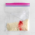 a bag of sprinkles and dye in a resealable bag