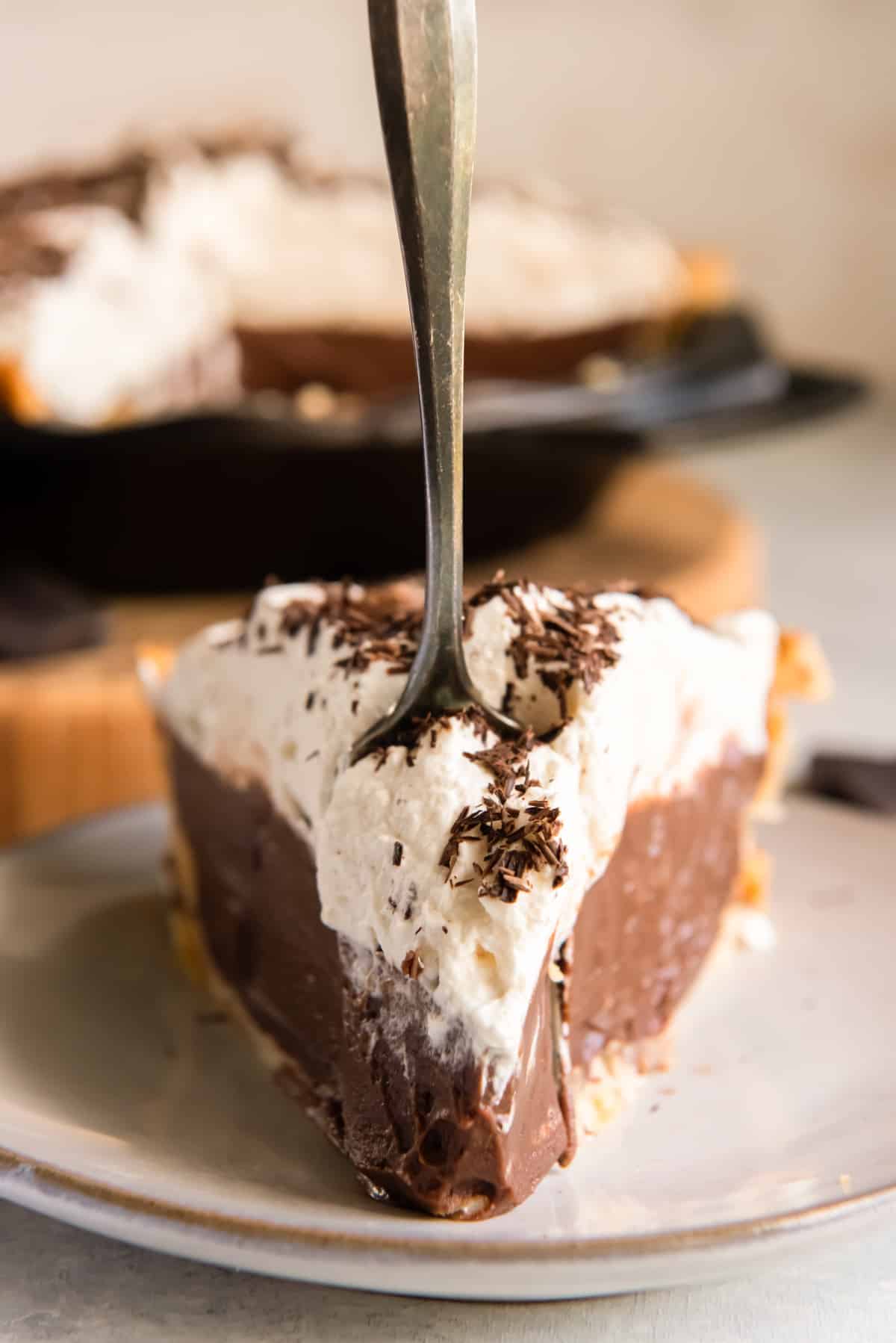 slice of chocolate cream pie viewed from the front