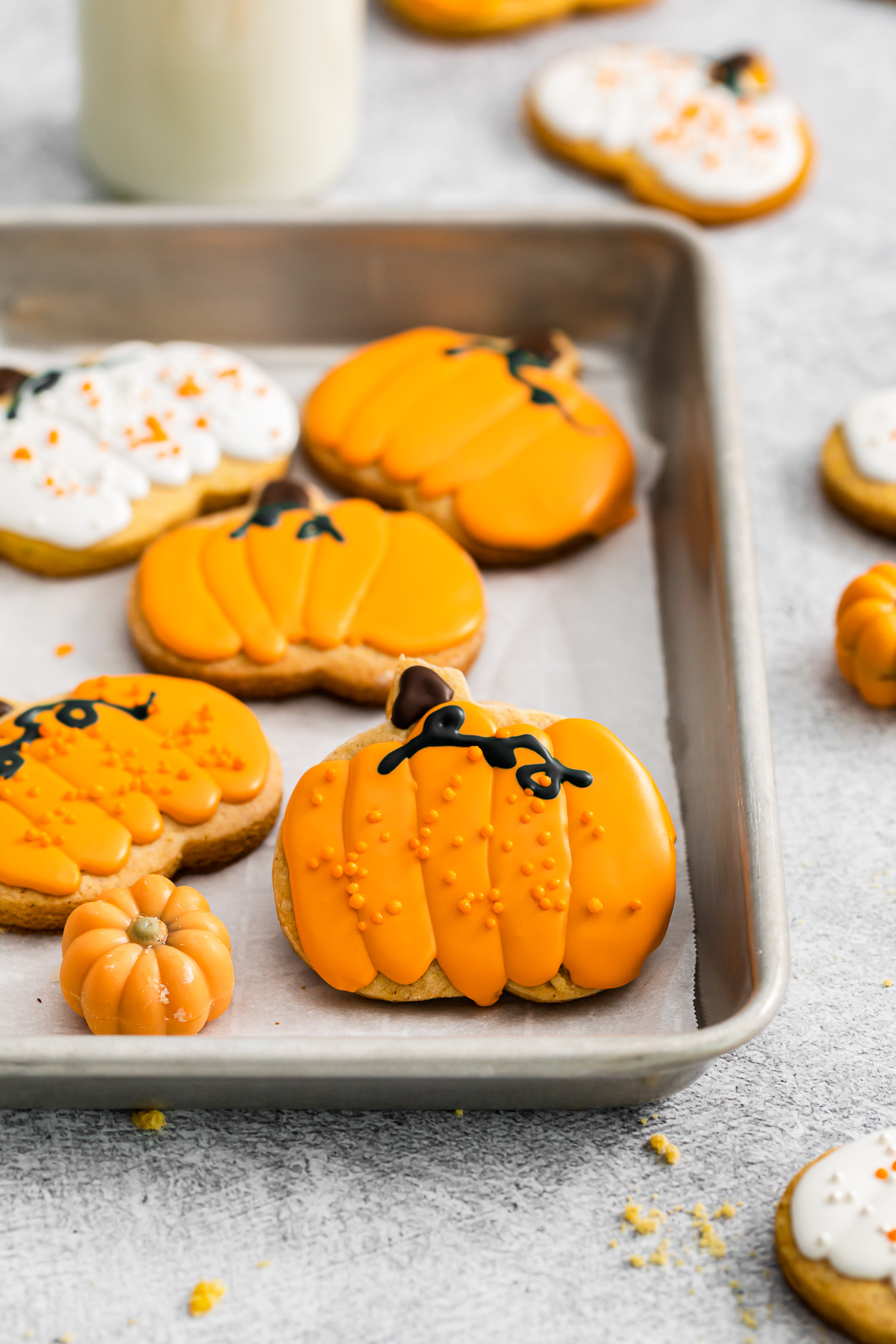 pumpkin sugar cookies on a tray