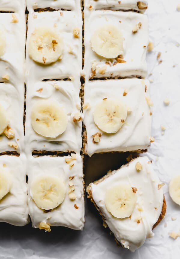 close up of cut banana cake with the bottom right slice askew.