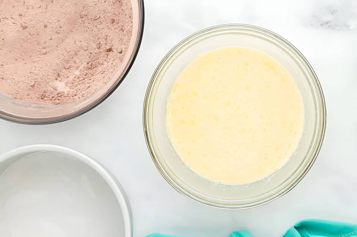 wet ingredients for cake batter in a glass bowl.