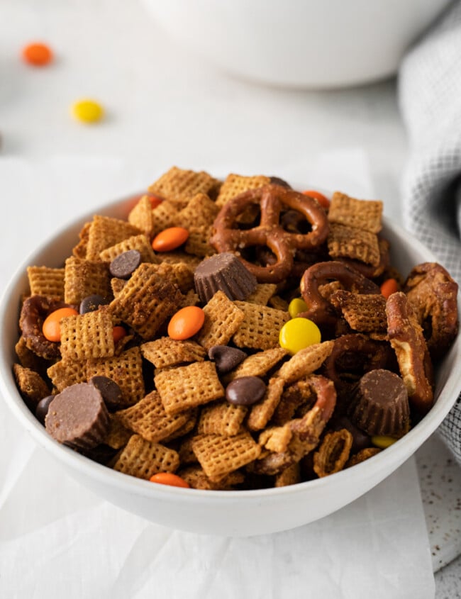 a bowl of chocolate peanut butter Chex mix