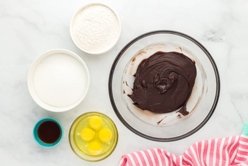 wet ingredients for chocolate brownies in a glass bowl.