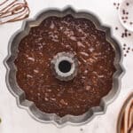 chocolate zucchini bundt cake batter in a bundt cake pan.