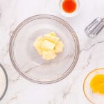 beaten butter in a glass bowl.