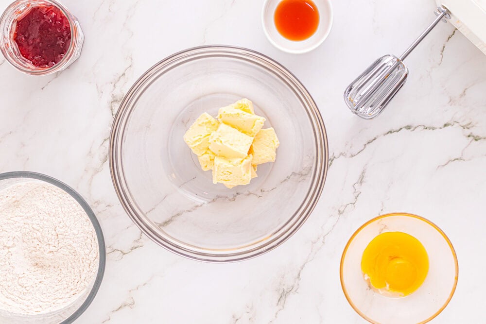 beaten butter in a glass bowl.