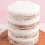 naked cake on a wooden cake board.