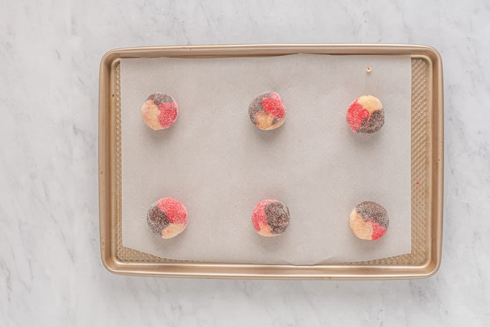 a tray of cookies on a white surface.