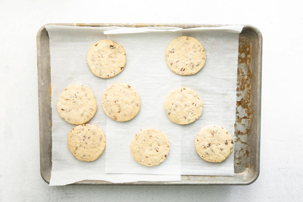 a tray of cookies on a white surface.