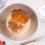 pumpkin ice cream ingredients in a mixing bowl, unmixed