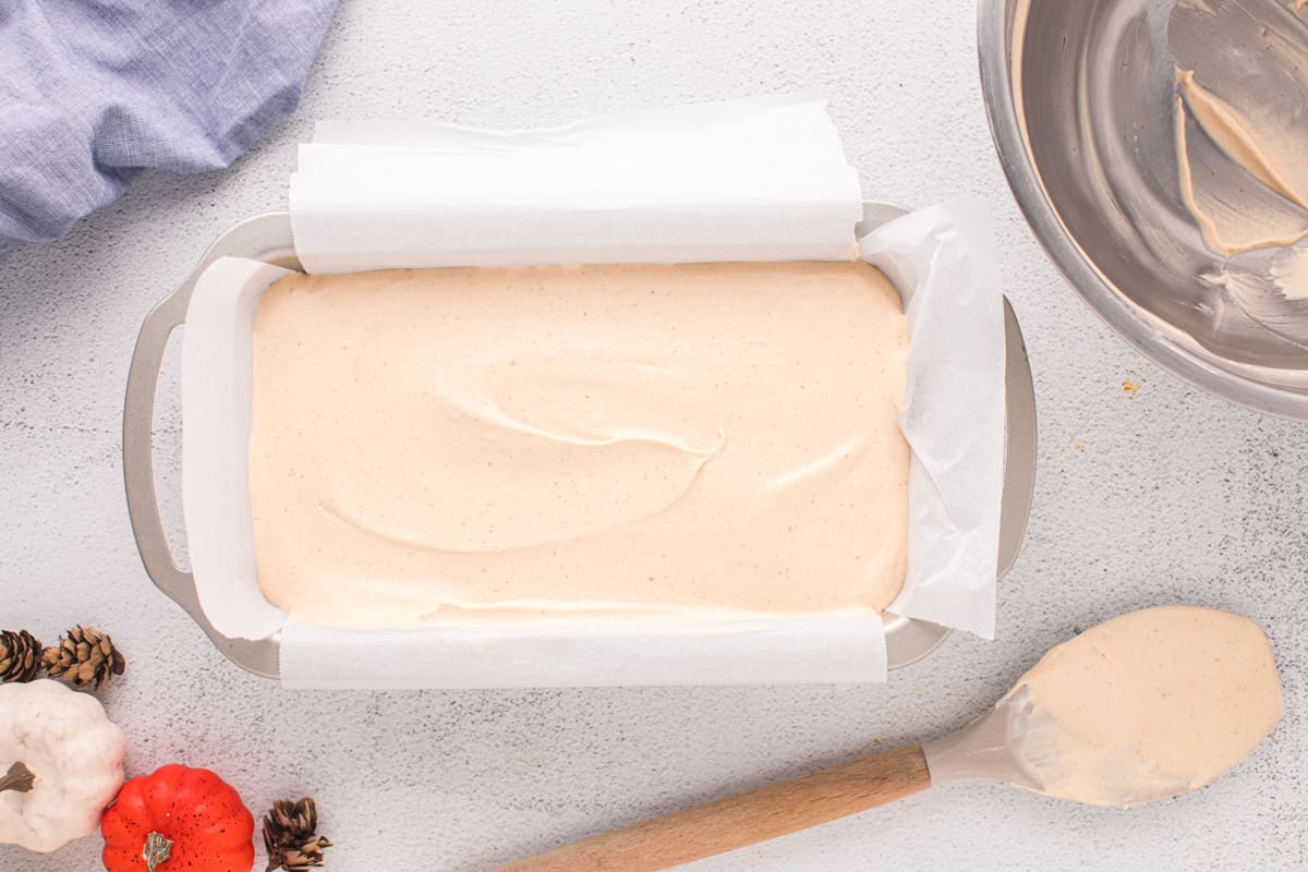 pumpkin ice cream smoothed into a bread pan