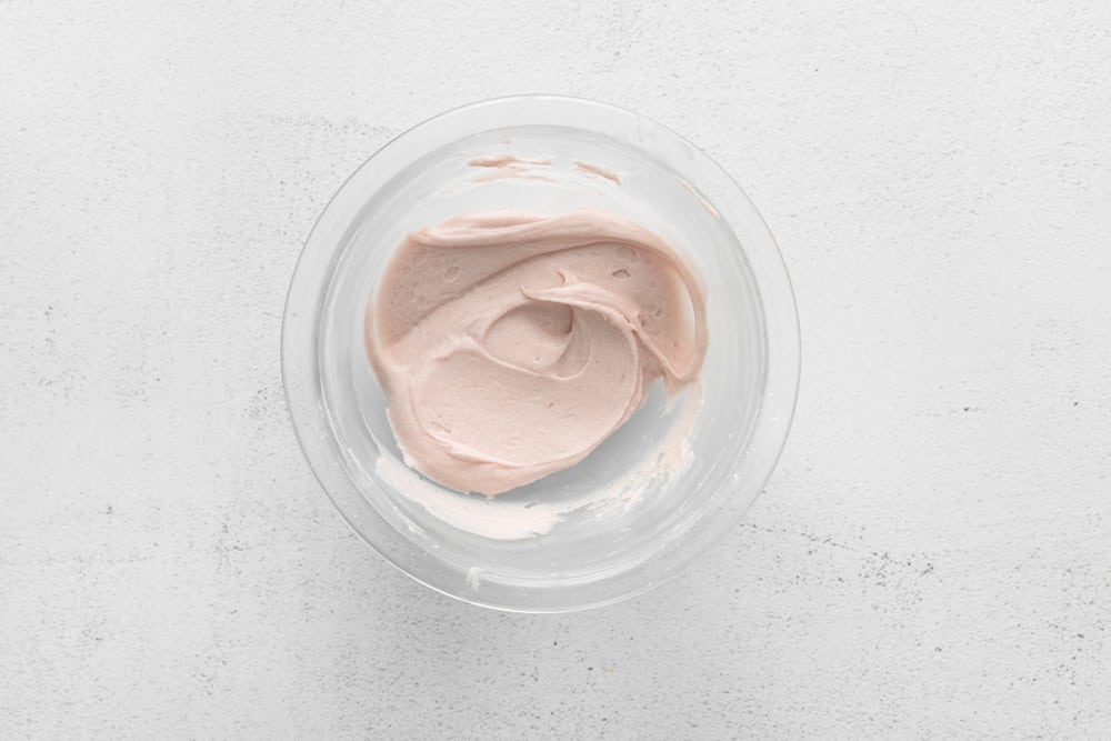 raspberry buttercream in a glass bowl.