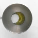 sugar and egg whites in a stainless mixing bowl.