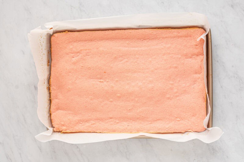 baked strawberry cake in a baking pan.