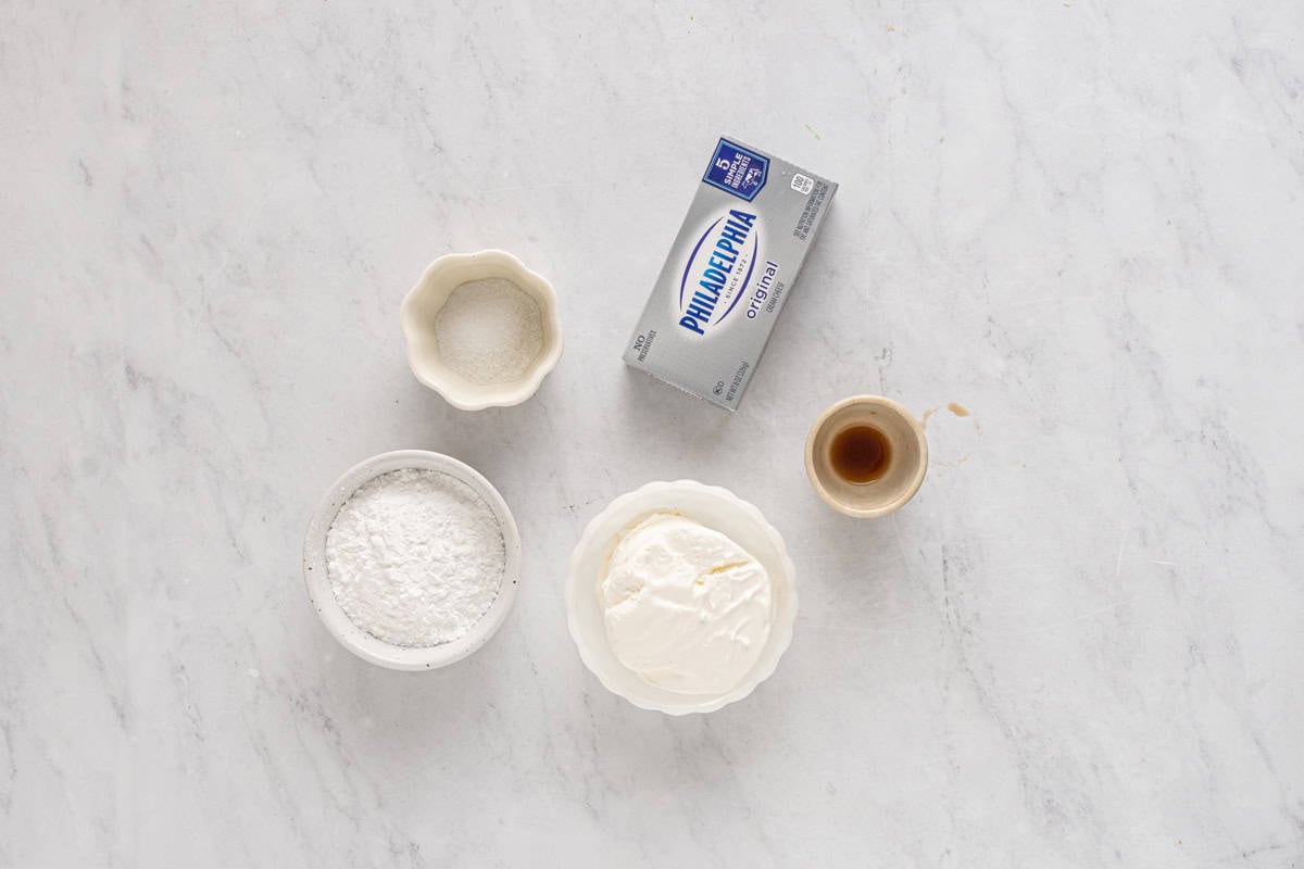 ingredients for cream cheese filling in individual bowls.