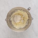 beaten sweetened cream cheese in a mixing bowl.