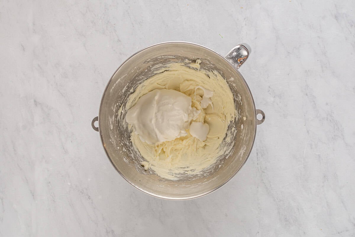 beaten sweetened cream cheese in a mixing bowl.