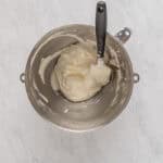 folding cool whip into beaten cream cheese with a rubber spatula.