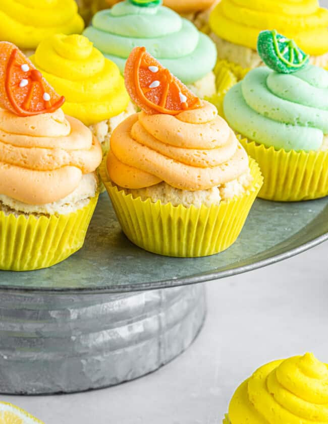 side view of sherbet cupcakes on a galvanized cake stand.