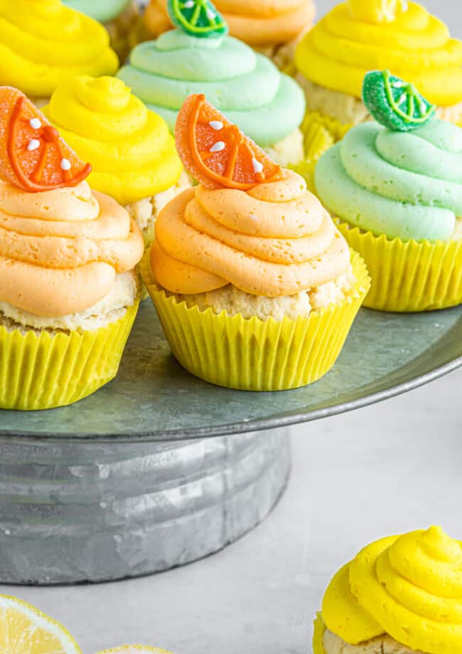 side view of sherbet cupcakes on a galvanized cake stand.