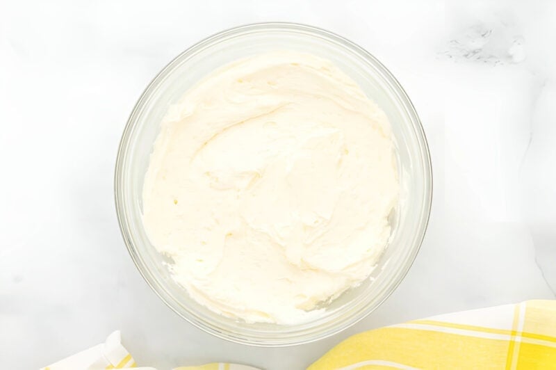 lemon buttercream frosting in a glass bowl.
