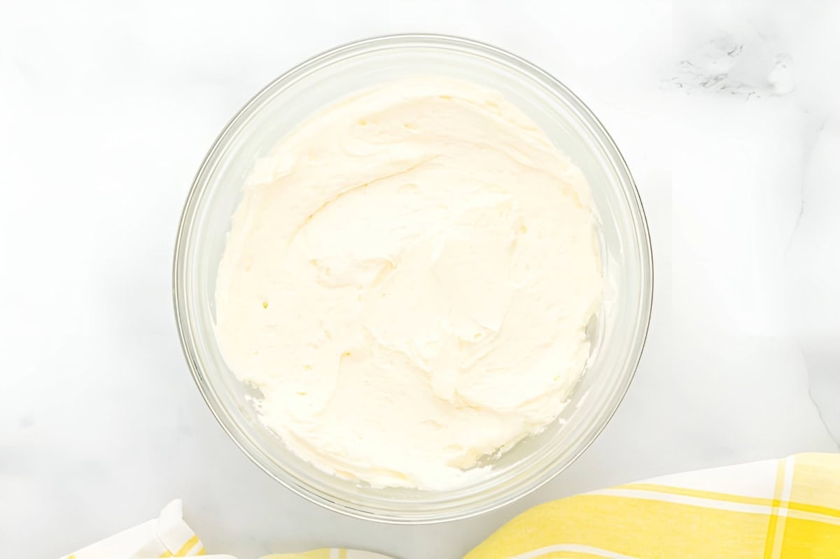 lemon buttercream frosting in a glass bowl.