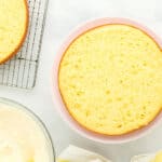 leveled lemon cake layer on a cake stand.
