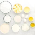 ingredients for moist lemon cake in individual bowls.