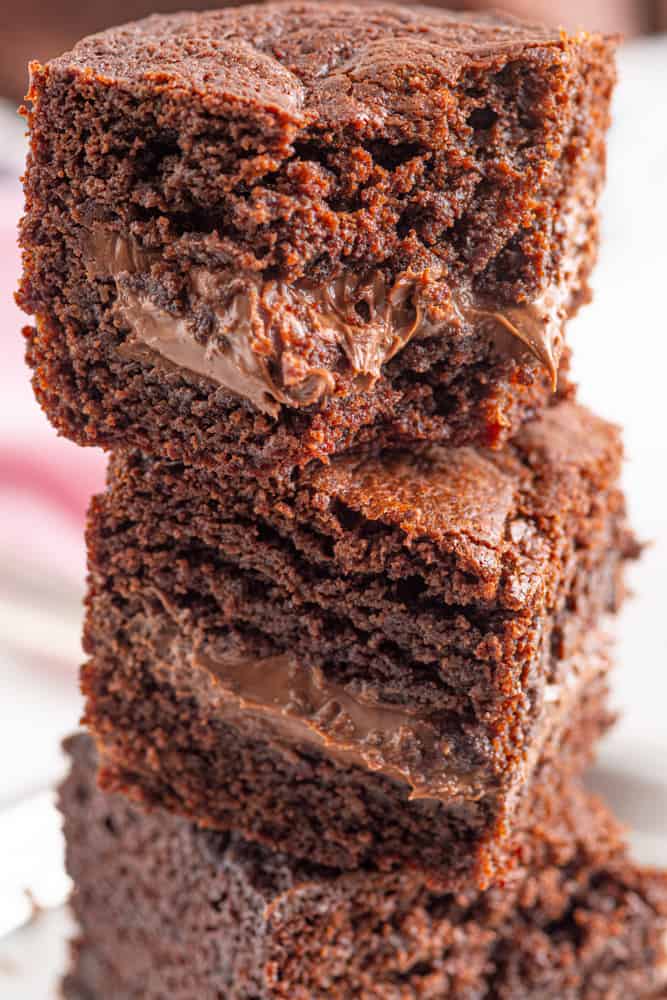 a stack of brownies stuffed with Nutella 