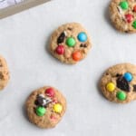 oreo monster cookies on a parchment lined baking tray